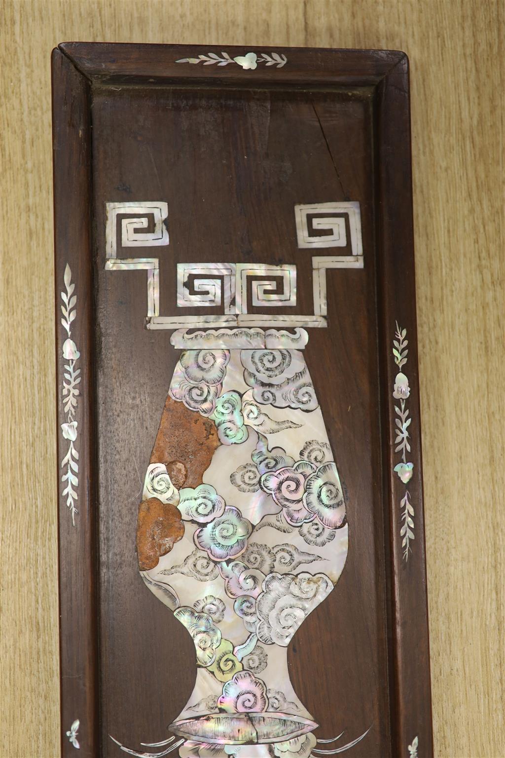 A Chinese hardwood and mother of pearl plaque, width 16.5cm height 65cm